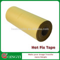 Yellow hot fix tape roll in adhesive tape